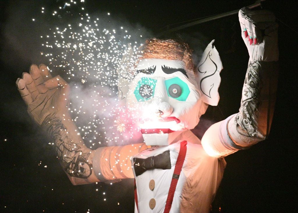 Pyrotechnics erupt from Zozobra's head